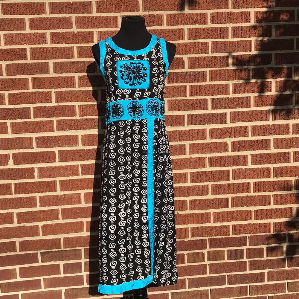 Beautiful and bright soft dress fits like a Medium
